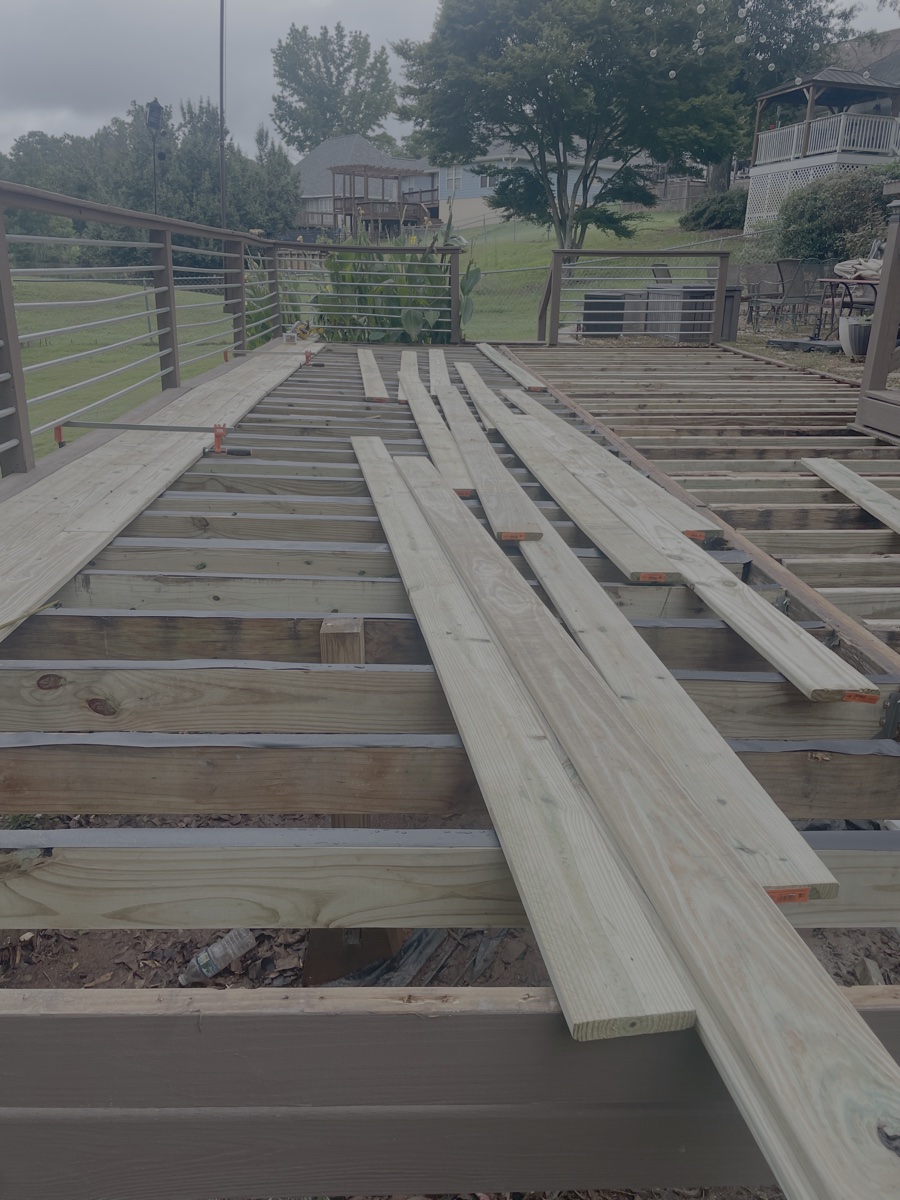Deck boards going down on the job site